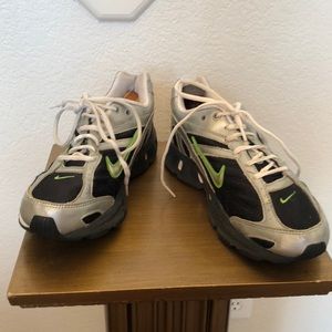 Green worn in places on bottom of shoes